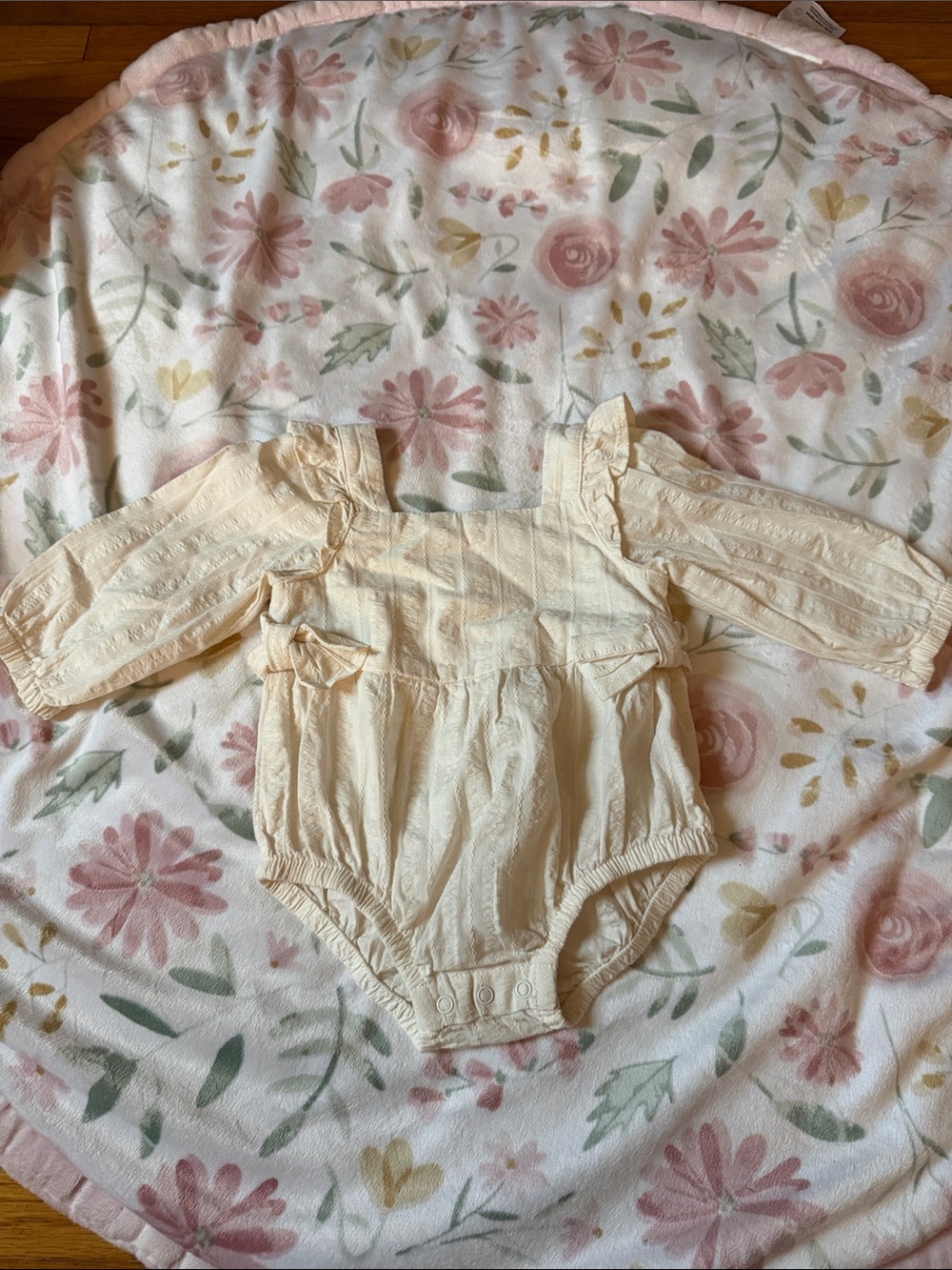 Cream Ruffle-Sleeve Baby One-Piece
